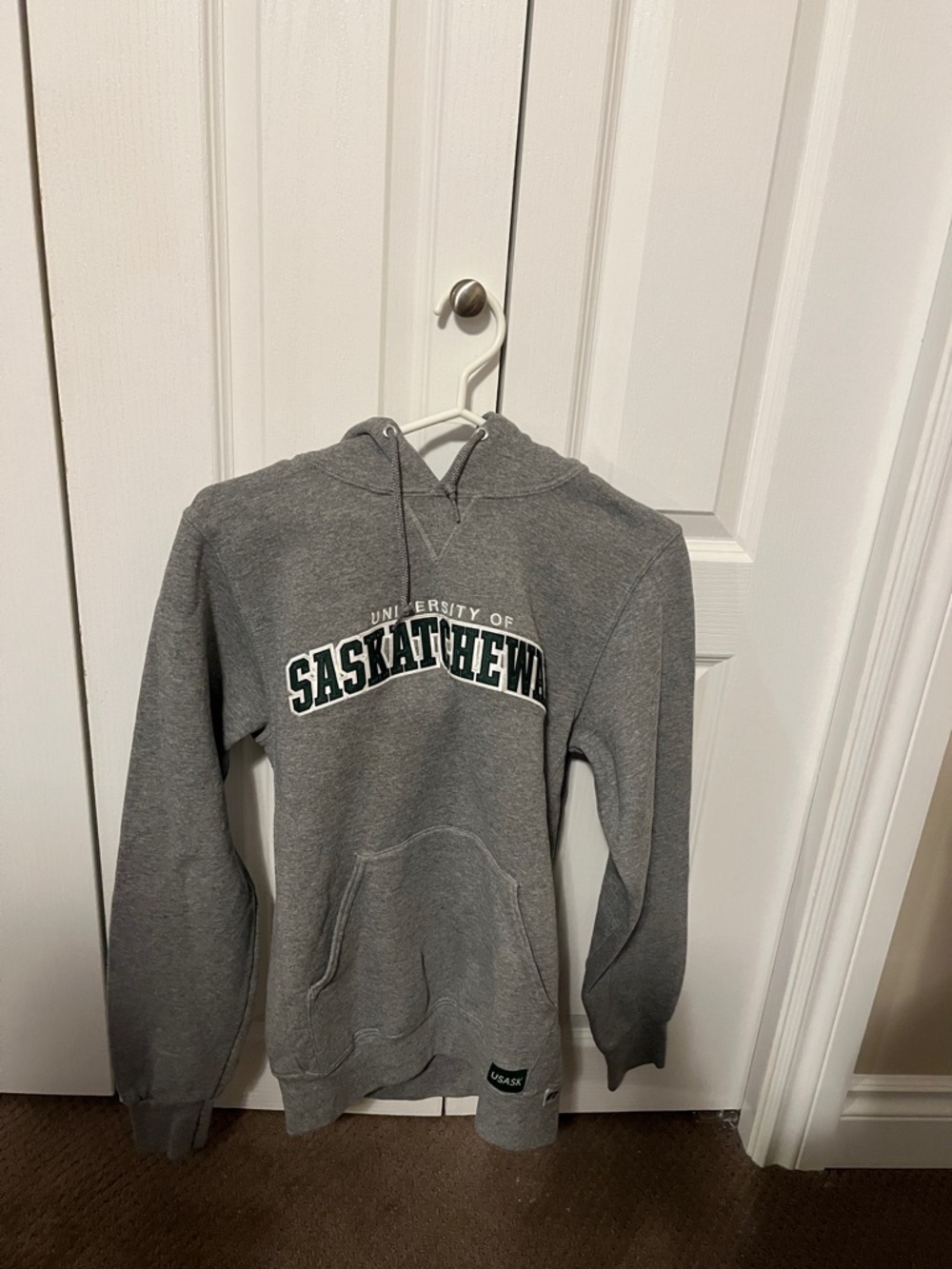 Russell Athletic Gray University of Saskatchewan Hoodie with Green Lettering